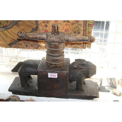 2015 - A Southern Indian carved wood press, of animal form.