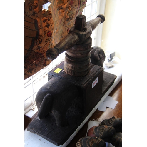 2015 - A Southern Indian carved wood press, of animal form.