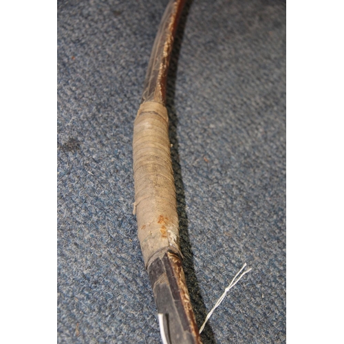 2018 - An old composite bow, painted and with traces of shark or ray skin, (a.f.).