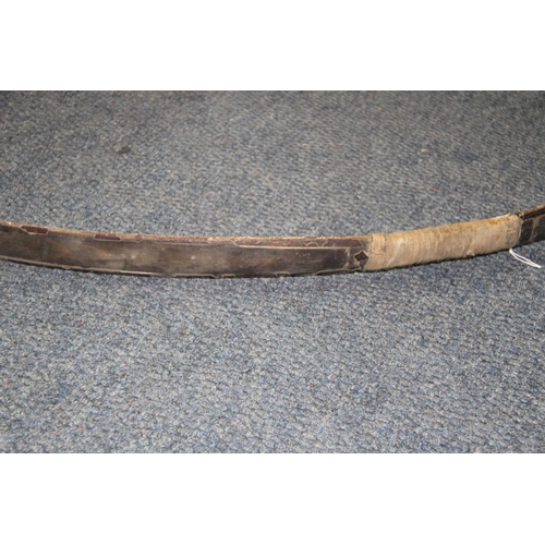 2018 - An old composite bow, painted and with traces of shark or ray skin, (a.f.).