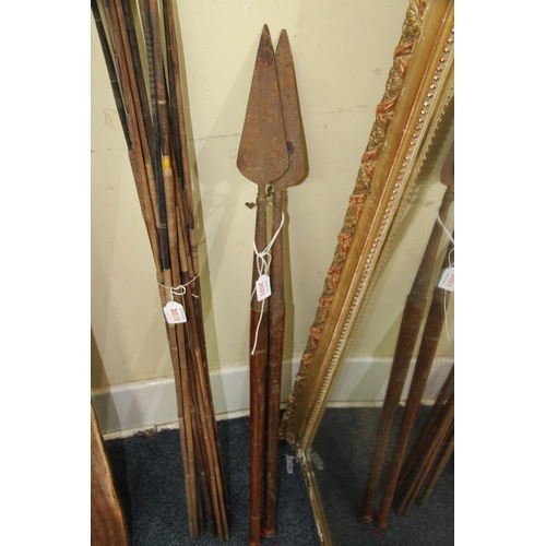 2021 - African: two short spears, having turned wood shafts ending in a ball finial, approx 99cm long.