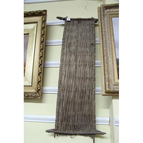 2033 - African: a bamboo shield, approx 88cm long.