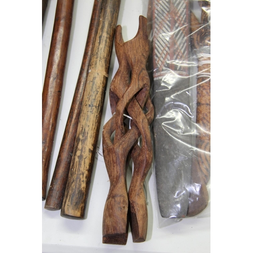 2040 - Oceanic: an Aboriginal boomerang; a painted spear thrower; and three other Aboriginal items. (5)