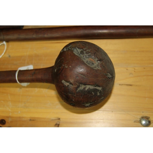 2044 - Oceanic: an old Fiji Ula throwing club, having root ball spherical head and tapering shaft with inci... 