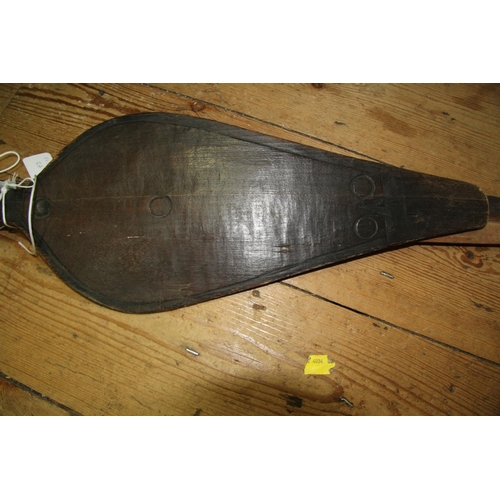 2056 - Oceanic: a paddle, with leaf shaped blade, 126cm long; together with another wooden spear, with geom... 