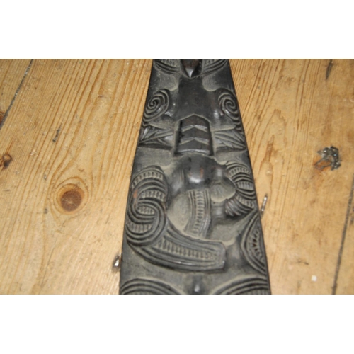 2057 - Oceanic: a 20th century Maori ornamental canoe paddle, carved tiki masks with inlaid shell eyes, app... 