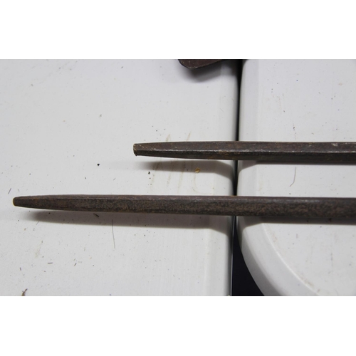 2069 - African: two Maasai spears having large steel heads, (89cm and 96.5cm long) and long metal tips, tot... 