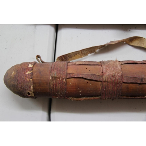 2098 - African: an old quiver containing hunting arrows, 76cm long, with shoulder strap.