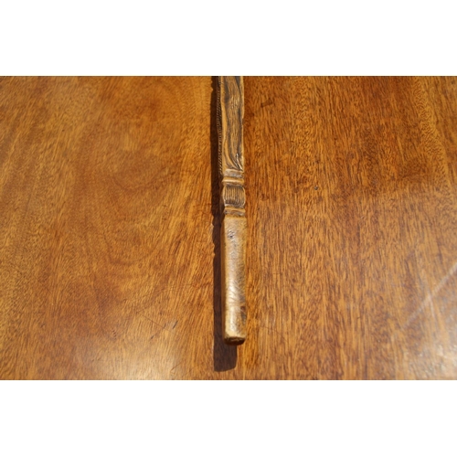 2104 - African: a West African figural walking stick.