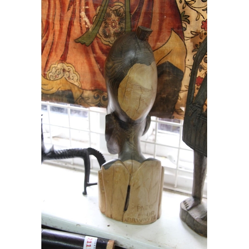 2105 - African: two carved wood figures, largest 48cm high.