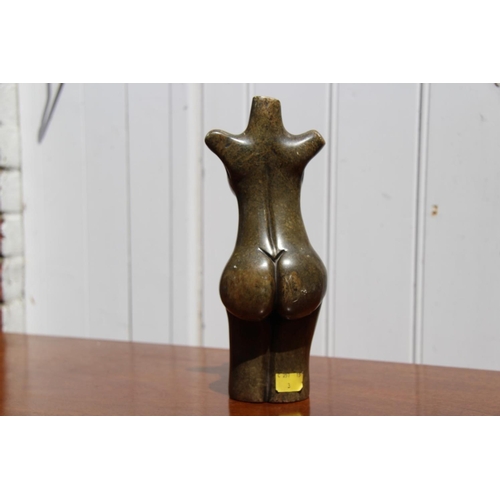 2106 - An African carved and polished torso, possibly Zimbabwe, 27.5cm high.