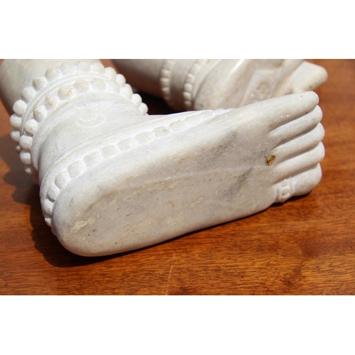 2107 - Two Indian marble carvings, in the form of a foot and hand.