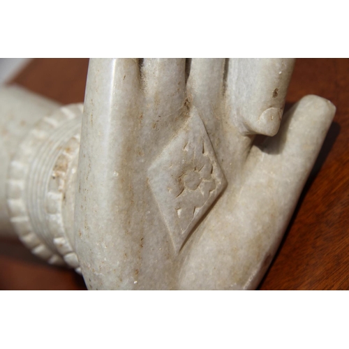 2107 - Two Indian marble carvings, in the form of a foot and hand.