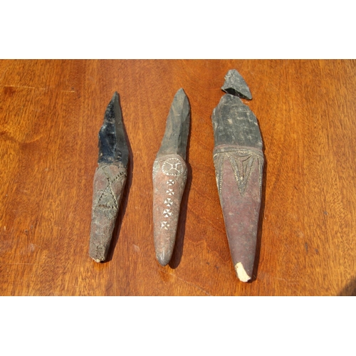 2111 - Oceanic: three Admiralty Island daggers with obsidian blades, the handles carved and decorated with ... 