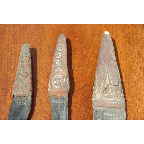 2111 - Oceanic: three Admiralty Island daggers with obsidian blades, the handles carved and decorated with ... 