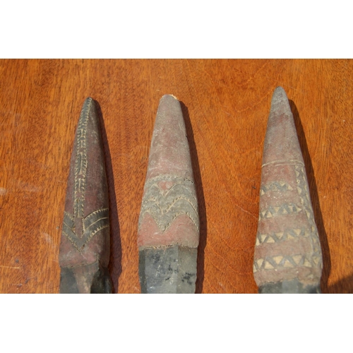 2112 - Oceanic: three Admiralty Island daggers with obsidian blades, the handles carved and decorated with ... 