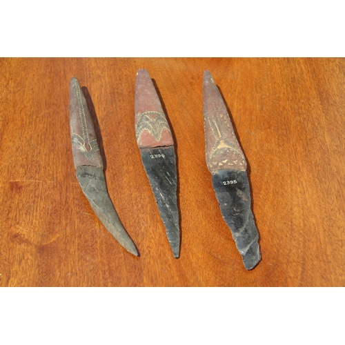 2112 - Oceanic: three Admiralty Island daggers with obsidian blades, the handles carved and decorated with ... 