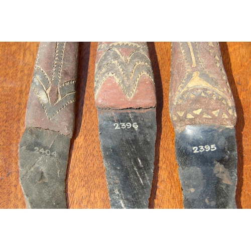 2112 - Oceanic: three Admiralty Island daggers with obsidian blades, the handles carved and decorated with ... 