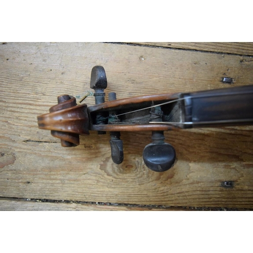 1863 - A antique Continental violin, with 14in walnut back, cased.