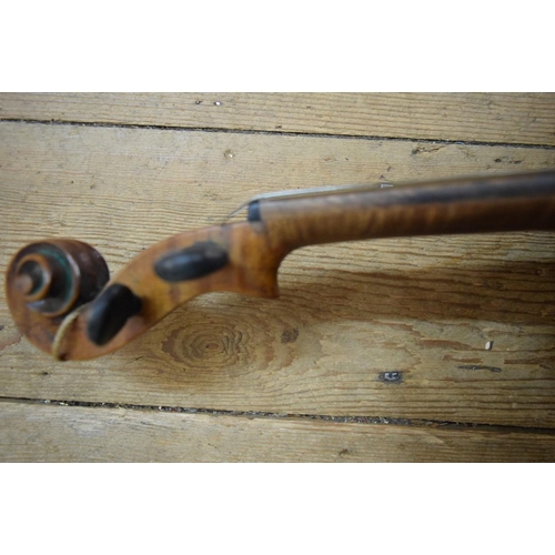 1863 - A antique Continental violin, with 14in walnut back, cased.