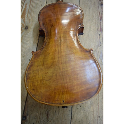 1863 - A antique Continental violin, with 14in walnut back, cased.