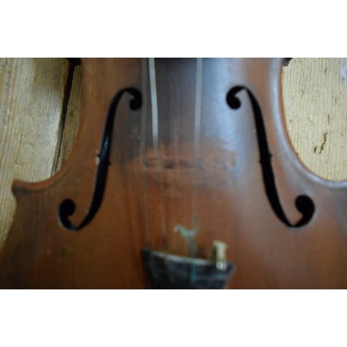 1863 - A antique Continental violin, with 14in walnut back, cased.