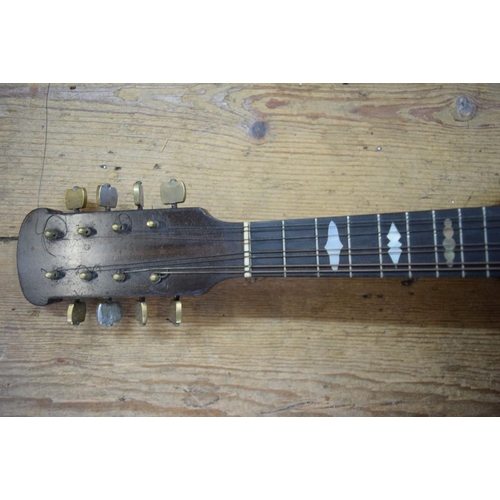 1867 - A flatback mandolin, labelled and inscribed 'John E Dallas', and numbered 4733, in tan leather case.