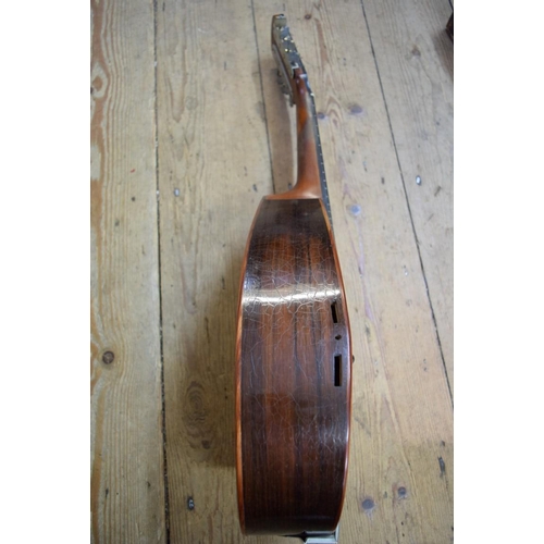 1867 - A flatback mandolin, labelled and inscribed 'John E Dallas', and numbered 4733, in tan leather case.