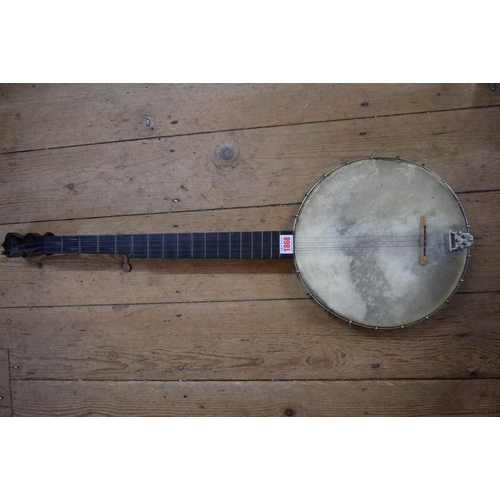 1868 - A five string banjo.