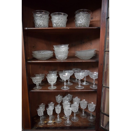 1876 - A suite of cut glass drinking glasses, (47).