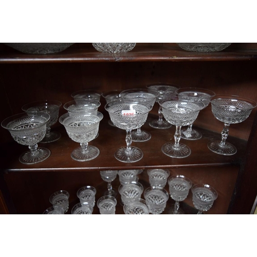 1876 - A suite of cut glass drinking glasses, (47).