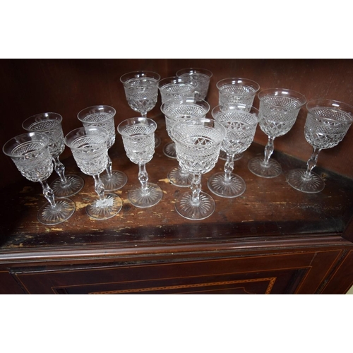 1876 - A suite of cut glass drinking glasses, (47).