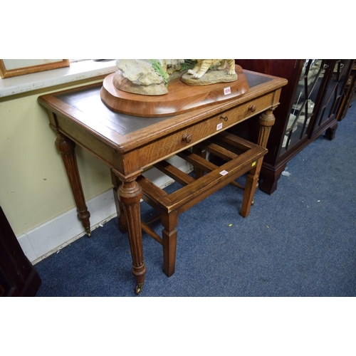 1877 - A Victorian oak desk, by Holland & Sons, with frieze drawer and fluted legs, 91cm wide.