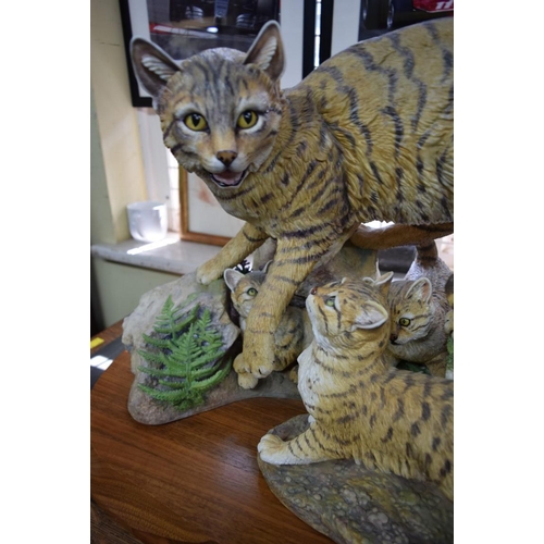 1879 - A Worcestershire Fine Art & Ceramics figure group of Scottish Wild Cats, numbered MM1, on walnut pli... 