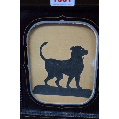 1881 - A 19th century silhouette of a dog, in a verre eglomise mount, 16 x 13cm; together with a watercolou... 