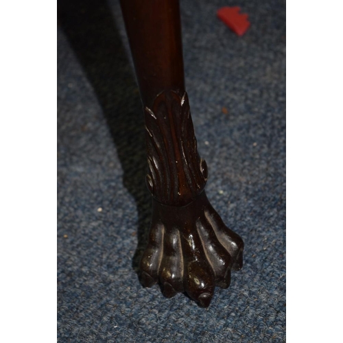 1887 - An 18th century Irish mahogany card table, on cabriole legs with paw feet, 86cm wide.