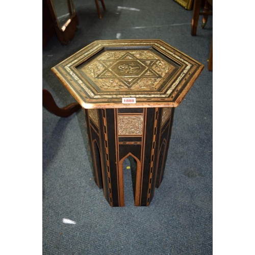 1888 - A late 19th/early 20th century ottoman mother of pearl inlaid hexagonal occasional table, in the man... 