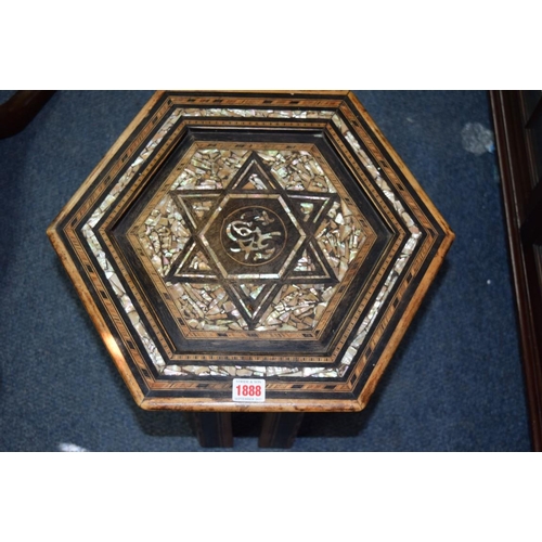 1888 - A late 19th/early 20th century ottoman mother of pearl inlaid hexagonal occasional table, in the man... 