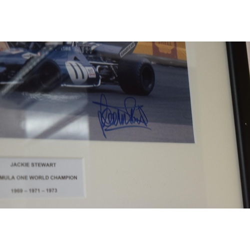 1891 - Formula One: a signed photograph of Jackie Stewart in Grand Prix car, 19.5 x 29.5cm.