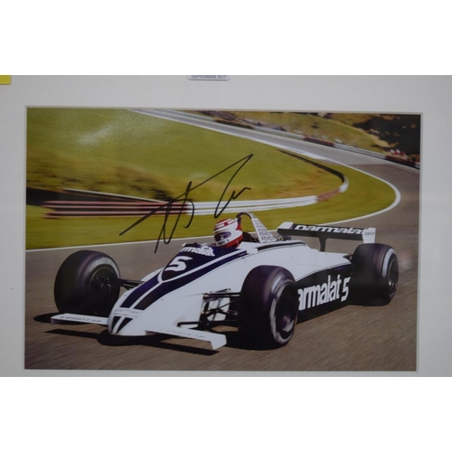 1892 - Formula One: a signed photograph of Nelson Piquet in Grand Prix car, 19.5 x 29.5cm. £30 - 40