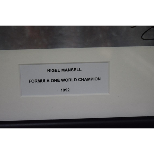 1893 - Formula One: a signed photograph of Nigel Mansell in Grand Prix car, 19.5 x 29.5cm. £30 - 40