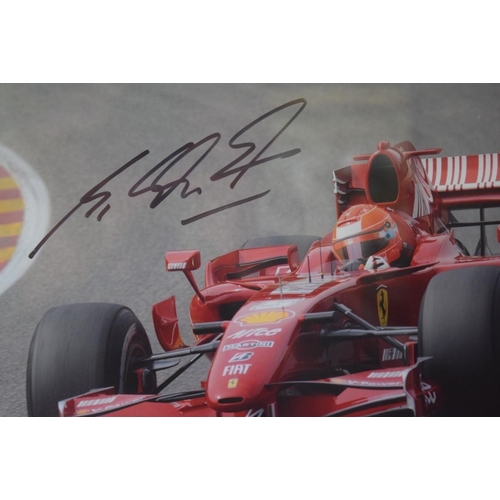 1894 - Formula One: a signed photograph of Michael Schumacher in Grand Prix car, 19.5 x 29.5cm.