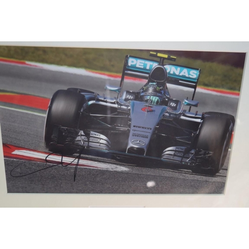 1895 - Formula One: a signed photograph of Nico Rosberg in Grand Prix car, 19.5 x 29.5cm. £30 - 40