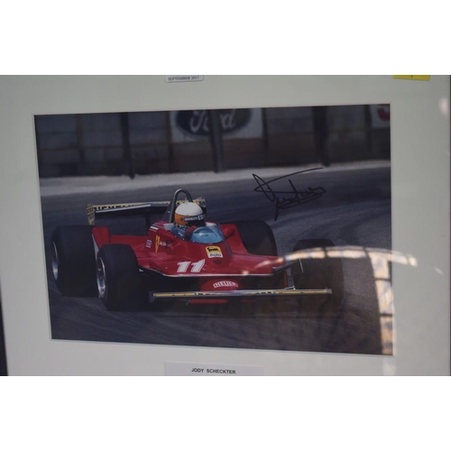 1896 - Formula One: a signed photograph of Jody Scheckter in Grand Prix car, 19.5 x 29.5cm.