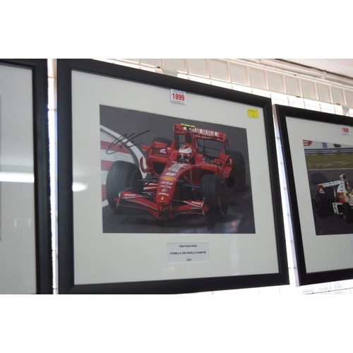 1899 - Formula One: a signed photograph of Kimi Raikkonen in Grand Prix car, 19.5 x 29.5cm. £30 - 40