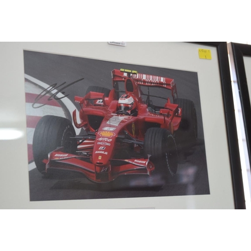 1899 - Formula One: a signed photograph of Kimi Raikkonen in Grand Prix car, 19.5 x 29.5cm. £30 - 40