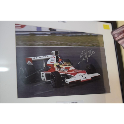 1900 - Formula One: a signed photograph of Emerson Fittipaldi in Grand Prix car, 19.5 x 29.5cm. £30 - 40