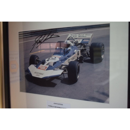 1901 - Formula One: a signed photograph of John Surtees in Grand Prix car, 19.5 x 29.5cm. £30 - 40