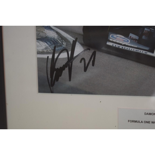 1902 - Formula One: a signed photograph of Damon Hill in Grand Prix car, 19.5 x 29.5cm. £30 - 40