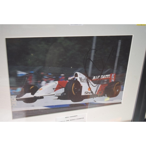 1905 - Formula One: a signed photograph of Mika Hakkinen in Grand Prix car, 19.5 x 29.5cm. £30 - 40